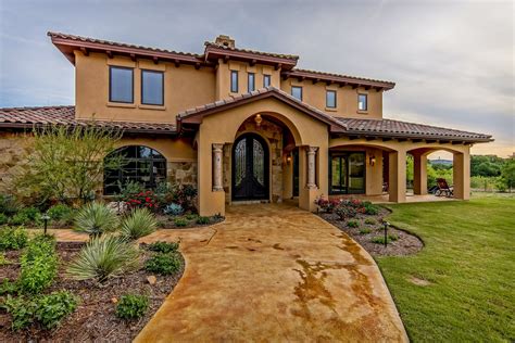 mediterranean house metal roof blue shutters|mediterranean house exterior colors.